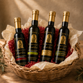 4 bottles of olive oil and balsamic vinegar from olive 'n vinnies