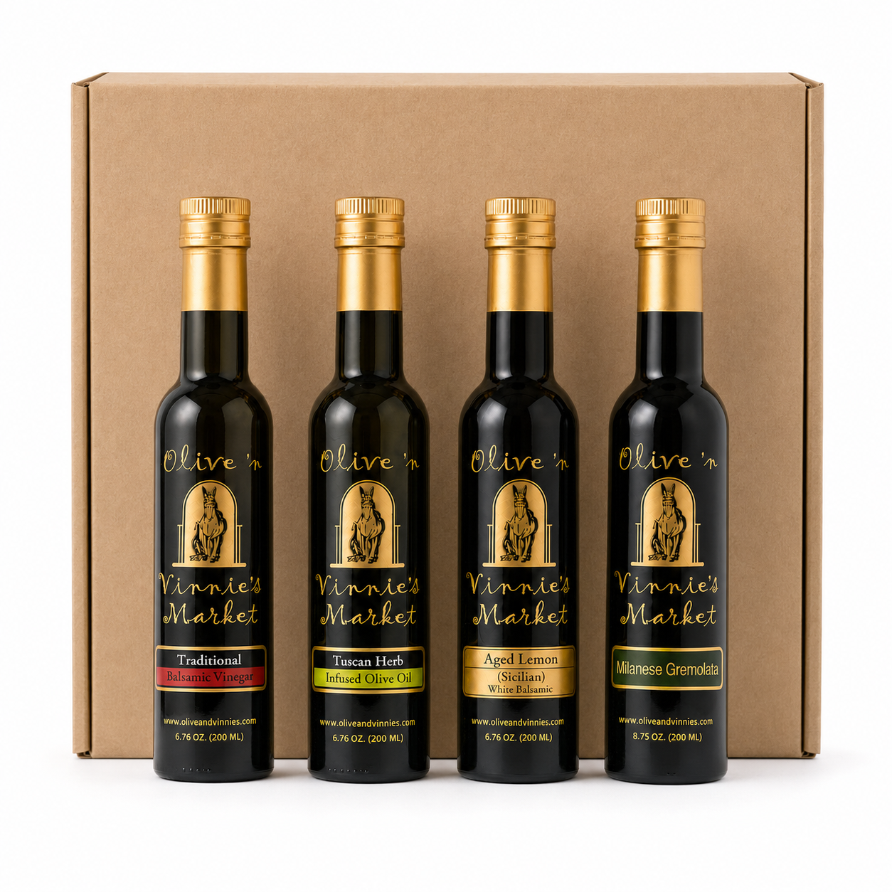 Four Olive 'n Vinnie's olive oils and balsamics in front of a kraft shipping box, Feast gift box