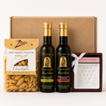 Olive 'n Vinnie's olive oil, balsamic, pasta, and dipping dish in front of a kraft shipping box, Spread gift box