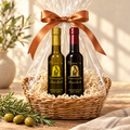 Olive ‘n Vinnie’s olive oil and balsamic gift basket wrapped in cellophane with a copper bow